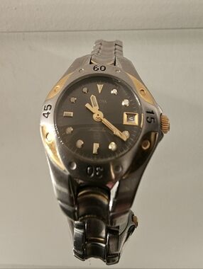 Vintage Bulova Marine Star Two-Tone Silver and Gold Women's Watch W Black Dial